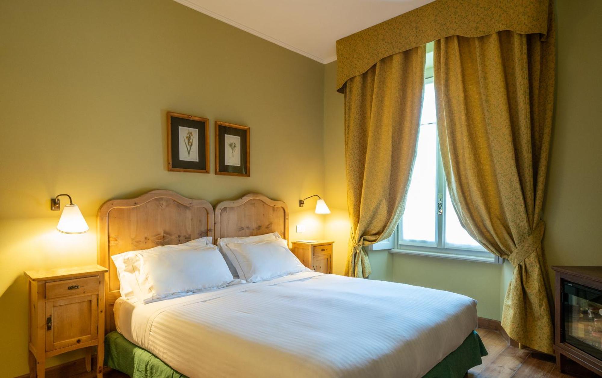 QC Terme Grand Hotel Bagni Nuovi Bormio Esterno foto A bedroom at the hotel